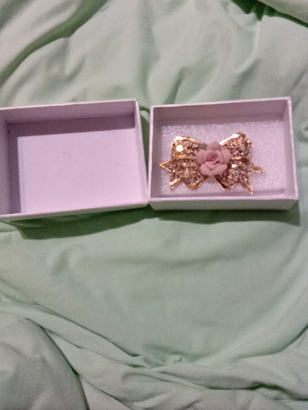 Gold-Tone Bow Brooch with Pink Rose Center